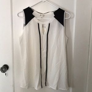 White blouse with black trim